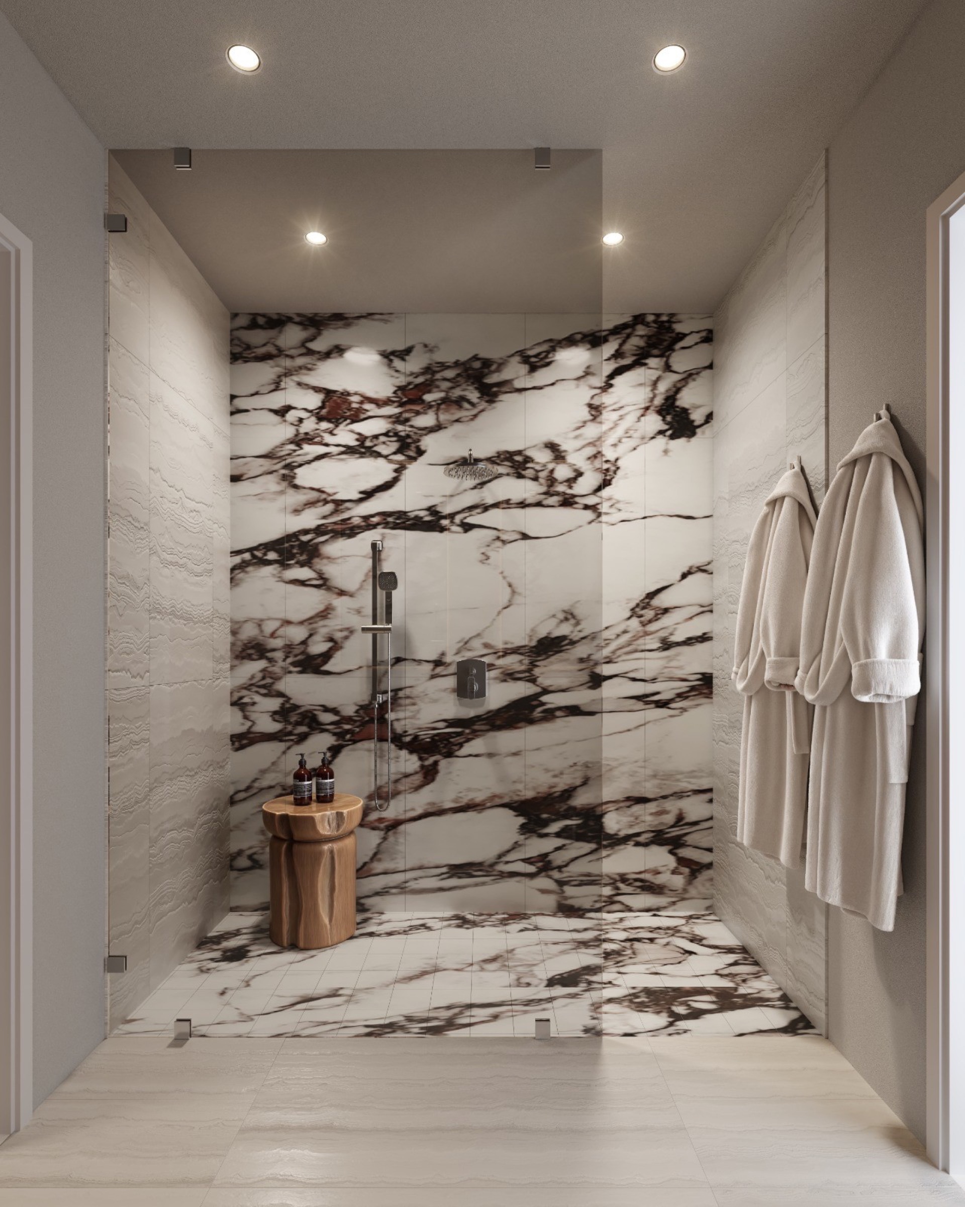 Primary bathroom shower at The Lincoln Coconut Grove Residences — floor-to-ceiling glass shower panels with premium Brizo fixtures and elegant Toto toilet.