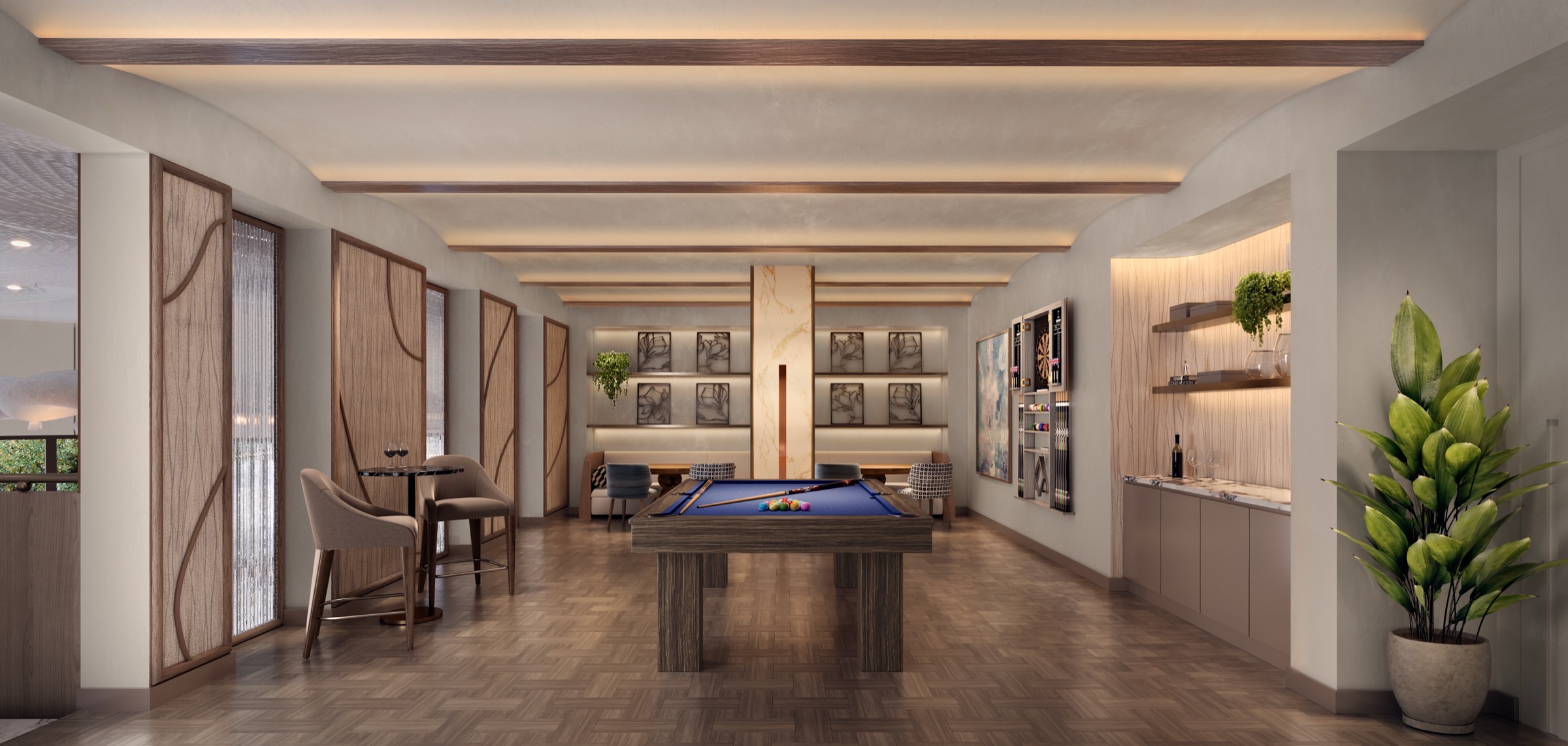 Mezzanine seating area at The Lincoln Coconut Grove Residences — sculptural staircase, layered lighting, and intimate lounge seating overlooking the lobby.