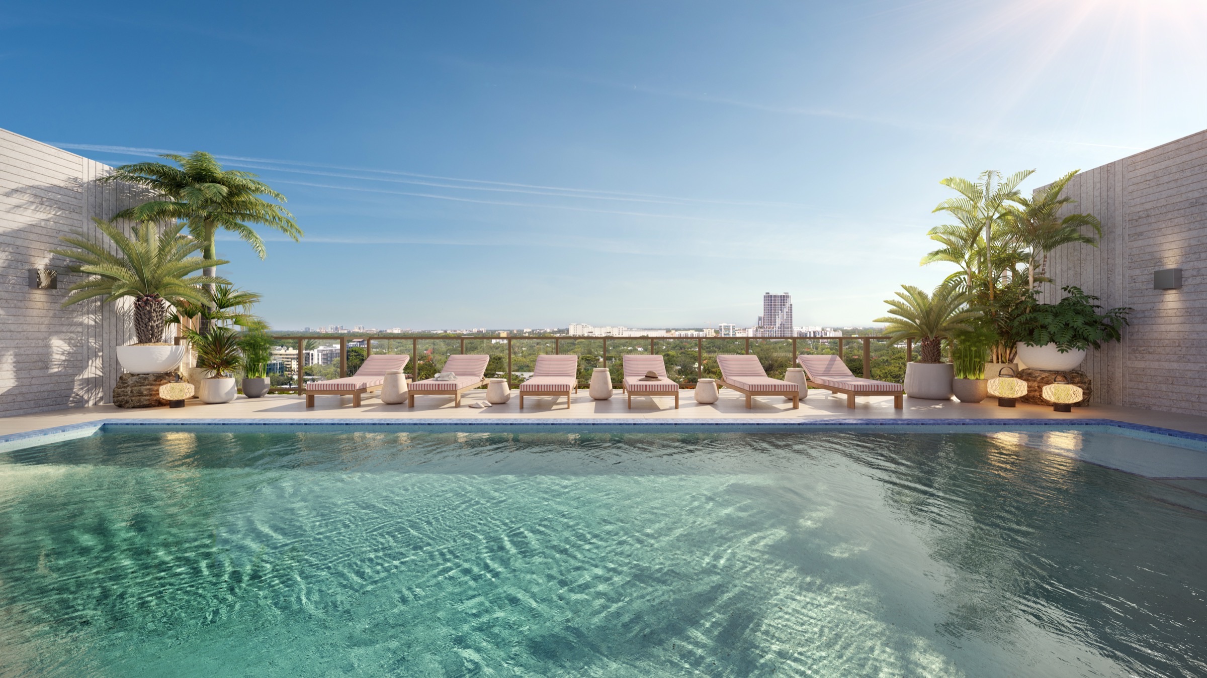 Rooftop pool at The Lincoln Coconut Grove Residences — 40-foot heated lap pool with covered cabanas and panoramic Coconut Grove views.