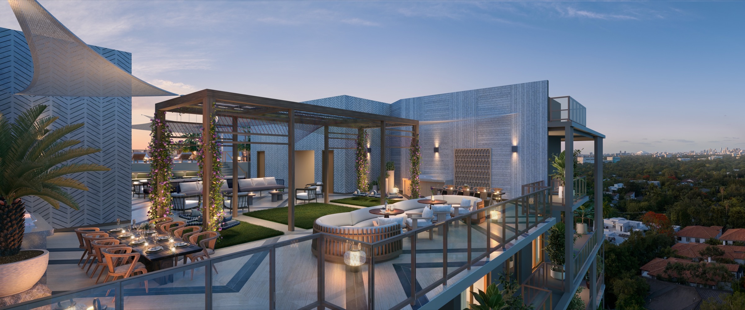 Rooftop lounge at dusk at The Lincoln Coconut Grove Residences — golden-hour ambient lighting, intimate seating clusters, summer kitchen beyond.